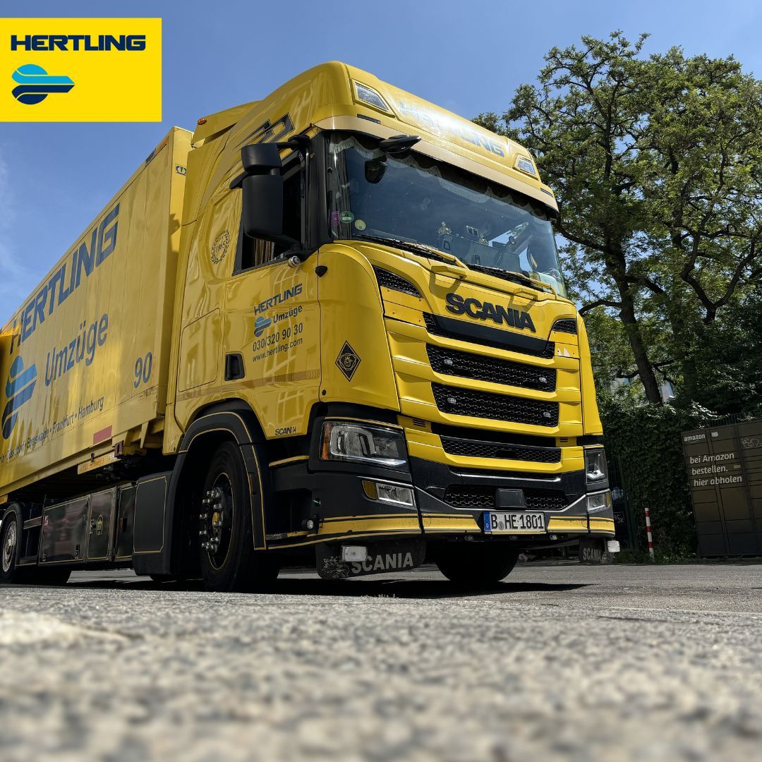 Yellow truck of the company Hertling